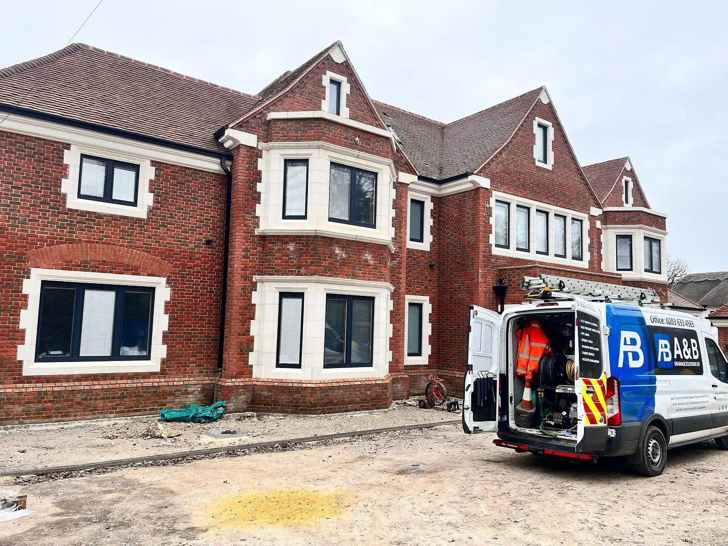 Commercial drainage maintenance in progress